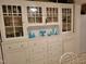 Built-in china cabinet with glass doors and plenty of storage space at 405 N Massey St, Selma, NC 27576