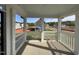 Covered back porch offering outdoor living space with views of the surrounding neighborhood at 4302 Emeline Way # 16, Fuquay Varina, NC 27526