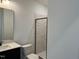 Bathroom featuring a vanity with a sink and a glass-enclosed shower at 4302 Emeline Way # 16, Fuquay Varina, NC 27526