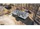 Overhead view of traditional single-story home with treed front yard at 4775 Barber Mill Rd, Clayton, NC 27520