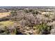 Expansive aerial view showcasing the property's vast land and wooded surroundings at 4775 Barber Mill Rd, Clayton, NC 27520