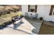 View of the back porch area featuring black metal seating and potted plants at 4775 Barber Mill Rd, Clayton, NC 27520