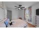 Comfortable bedroom featuring hardwood floors, natural light, and decor at 4775 Barber Mill Rd, Clayton, NC 27520