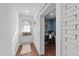 Conveniently located laundry area near the entryway, featuring modern appliances and ample lighting at 4775 Barber Mill Rd, Clayton, NC 27520