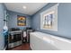 Functional laundry room with modern appliances, a large window, and ample storage space at 4775 Barber Mill Rd, Clayton, NC 27520