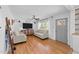 Bright and airy living room featuring hardwood floors, neutral paint, and natural light at 4775 Barber Mill Rd, Clayton, NC 27520