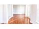 Open foyer with hardwood flooring and a view into a bright living space at 503 Gray Marble Rd, Morrisville, NC 27560
