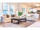 Comfortable living room with large windows, stylish furniture, and an open layout at 503 Gray Marble Rd, Morrisville, NC 27560