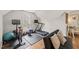 Home gym features an exercise bike, weights, treadmill, and padded floor at 5032 Big Creek Rd, Raleigh, NC 27613