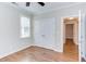 Bedroom featuring hardwood floors, base molding, neutral paint and closet at 604 Copperline Dr # 108, Chapel Hill, NC 27516