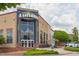 Attractive mixed-use building with an eye-catching facade design offers a commercial space with abundant natural light at 604 Copperline Dr # 108, Chapel Hill, NC 27516