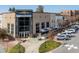 Commercial building featuring a unique facade, ample parking, and inviting entrance in a bustling area at 604 Copperline Dr # 108, Chapel Hill, NC 27516