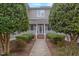 Attractive building exterior with well-manicured landscaping and inviting entrance at 604 Copperline Dr # 108, Chapel Hill, NC 27516