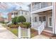 Charming townhomes with covered patios, neutral siding, and brick accents at 604 Copperline Dr # 108, Chapel Hill, NC 27516