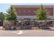 Street view showing Weaver Street Market with outdoor seating, creating an inviting community atmosphere at 604 Copperline Dr # 108, Chapel Hill, NC 27516