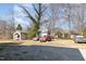 Backyard showing multiple vehicles at 616 N Mebane St, Burlington, NC 27217
