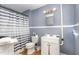 Neat bathroom featuring shower/tub combination, toilet, sink and vanity at 616 N Mebane St, Burlington, NC 27217