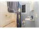 Bathroom featuring a shower/tub combo and a blue shower curtain at 616 N Mebane St, Burlington, NC 27217