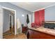 Inviting bedroom with doorway to other rooms and a relaxing atmosphere at 616 N Mebane St, Burlington, NC 27217