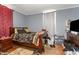 Comfortable bedroom with classic details and a cozy atmosphere for relaxation at 616 N Mebane St, Burlington, NC 27217