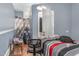 Bright bedroom with a desk and a view through the doorway to another room at 616 N Mebane St, Burlington, NC 27217