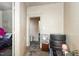 A hallway with a bedroom on one side and another room in the background at 616 N Mebane St, Burlington, NC 27217