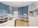 Simple kitchen featuring essential appliances and abundant natural light from the window at 616 N Mebane St, Burlington, NC 27217