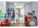 Convenient laundry area with modern appliances for easy chores and access to other rooms at 616 N Mebane St, Burlington, NC 27217