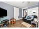 Inviting living room with vintage details and natural light, perfect for relaxing at 616 N Mebane St, Burlington, NC 27217
