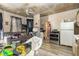 View of a living room that connects to the kitchen, showing an open layout at 616 N Mebane St, Burlington, NC 27217