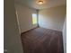 Neutral bedroom featuring carpeted floor, a window and a ceiling light at 72 E Victory View Ter, Smithfield, NC 27577