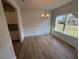 Light-filled dining room with wood floors and a view of the outside at 72 E Victory View Ter, Smithfield, NC 27577