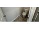 Powder room with standard toilet and neutral flooring at 72 E Victory View Ter, Smithfield, NC 27577