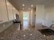 Open kitchen with granite counters and white cabinets at 72 E Victory View Ter, Smithfield, NC 27577