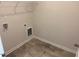 Functional laundry room features tile flooring, and wire shelving at 72 E Victory View Ter, Smithfield, NC 27577