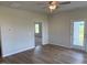 Living area with an open layout featuring light, neutral walls and modern lighting at 72 E Victory View Ter, Smithfield, NC 27577
