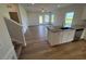 Living room featuring neutral walls, wood floors, and lots of natural light at 72 E Victory View Ter, Smithfield, NC 27577