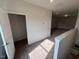 Upstairs loft area with neutral carpet, and white trim at 72 E Victory View Ter, Smithfield, NC 27577