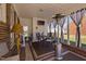 Covered patio with a dining table, seating, privacy curtains, and a heater at 74 Azalea Dr, Roxboro, NC 27573