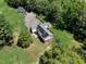 An aerial view of the house, which has solar panels, and the large lot at 76 Traceway N, Sanford, NC 27332