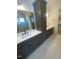 Modern bathroom featuring double sinks, plenty of storage, and elegant fixtures at 80 Valebrook Ct, Youngsville, NC 27596