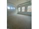 Large bedroom with tray ceiling and multiple windows providing lots of natural light at 80 Valebrook Ct, Youngsville, NC 27596