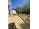 New wooden deck and railing offering the perfect space for outdoor entertaining with beautiful backyard views at 80 Valebrook Ct, Youngsville, NC 27596