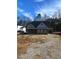 Well-built house featuring stone accents, an attached two-car garage, and a large backyard at 80 Valebrook Ct, Youngsville, NC 27596