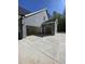 Spacious three car garage with ample parking and storage space at 80 Valebrook Ct, Youngsville, NC 27596