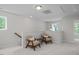 Cozy bonus room with reading nook and relaxing natural light at 82 Fairwinds Dr, Lillington, NC 27546