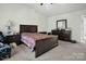 Comfortable bedroom showcasing warm colors and soft carpeting at 1 Red Feather Ct, Durham, NC 27704