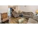 Cozy living room with zebra print seating, wood laminate flooring, and view into the dining area at 100 Forsyth Dr, Chapel Hill, NC 27517