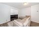 Living room with a sectional sofa, television, and decorative rug at 100 Forsyth Dr, Chapel Hill, NC 27517
