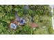 Private estate featuring a pool, pond, solar panels, and extensive landscaping at 1017 Holly Creek Ln, Chapel Hill, NC 27516